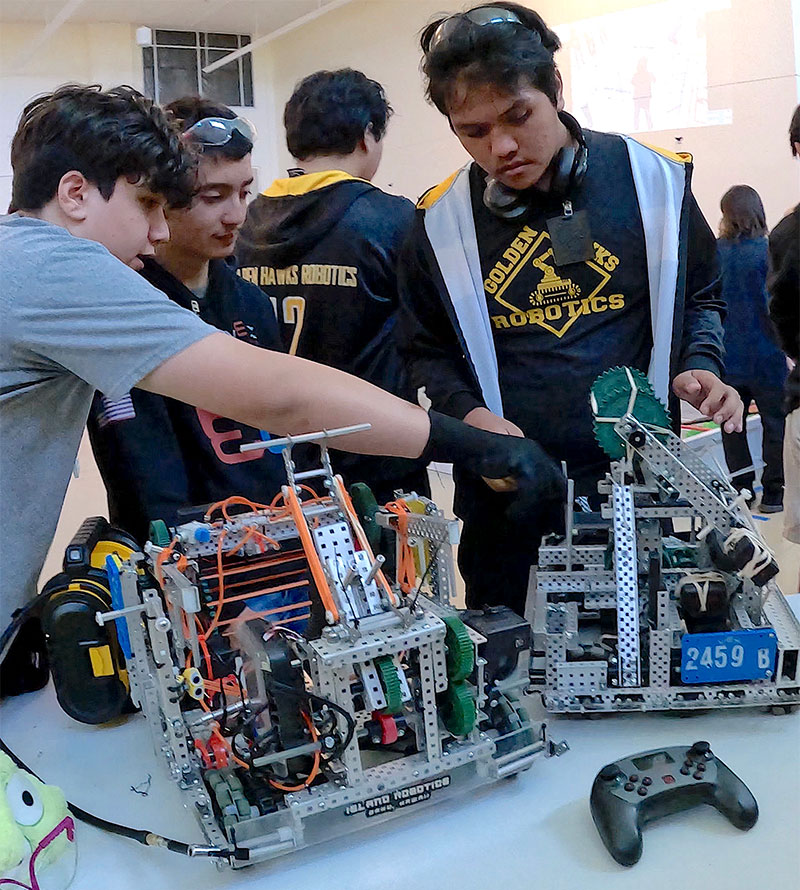 students repair robot